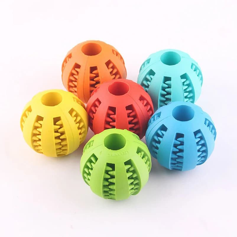Pet leaking ball toys dogs playing with natural rubber leaking device gripping and biting and grinding elastic toys