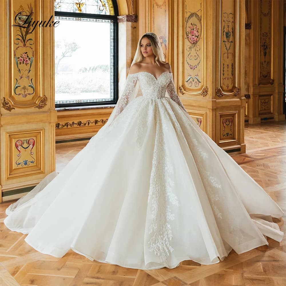Liyuke Beauty Beading Pearls Ball Gown Princess Wedding dress Off Shoulder Full Sleeves Sparking Lace Court Train Bridal Gowns