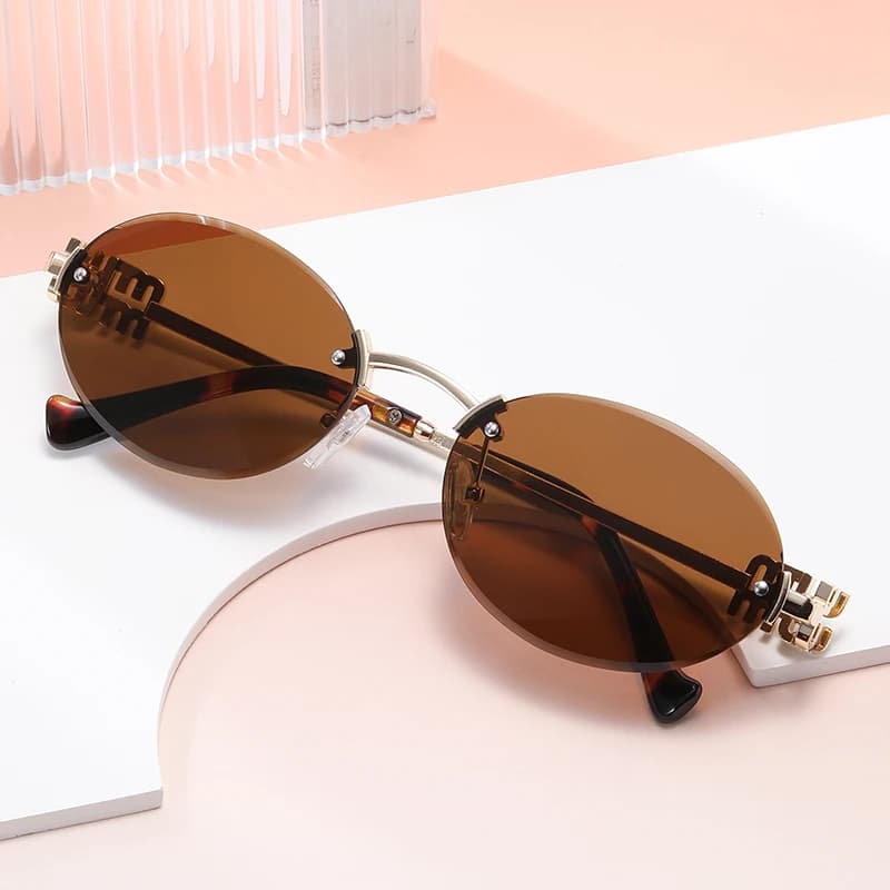 Fashion Men And Women Sun Shading Oval Sunglasses For Summer Travel Uv400 Frameless Sunglasses Round Fashion