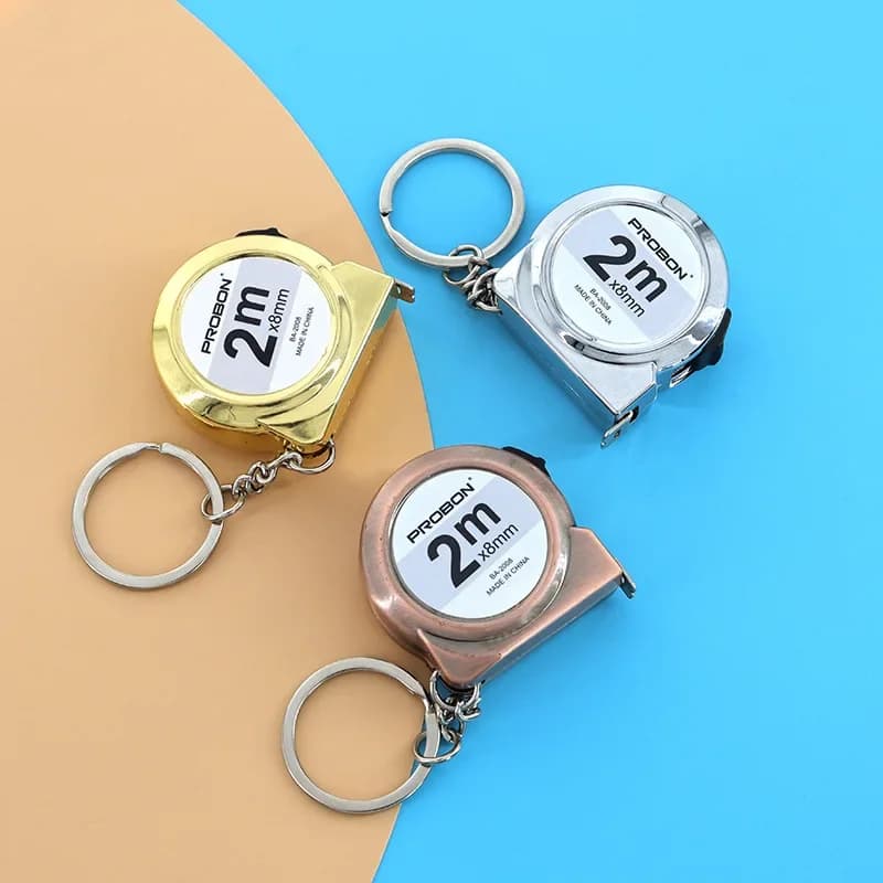 Portable Mini Tape Measure Retractable 2m Mild Steel Keychain Design Small Household Measuring Tool for DIY Crafting and Sewing