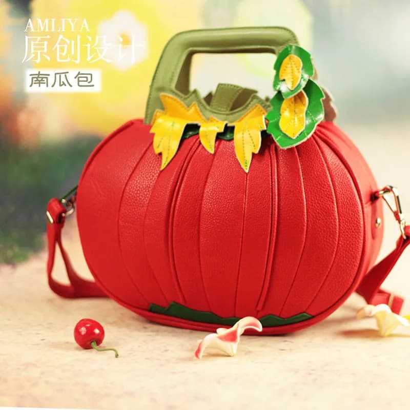 New leather women's bag in spring and summer Handheld one shoulder messenger bag Small round bag Pumpkin creative bag
