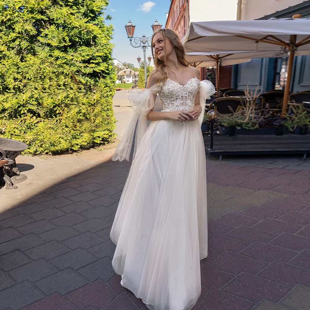 Sexy A-Line Wedding Dresses Sweetheart Sleeveless Tulle Bridal Growns Bow Appliques Back Zipper Floor Length Vestidos De Novia